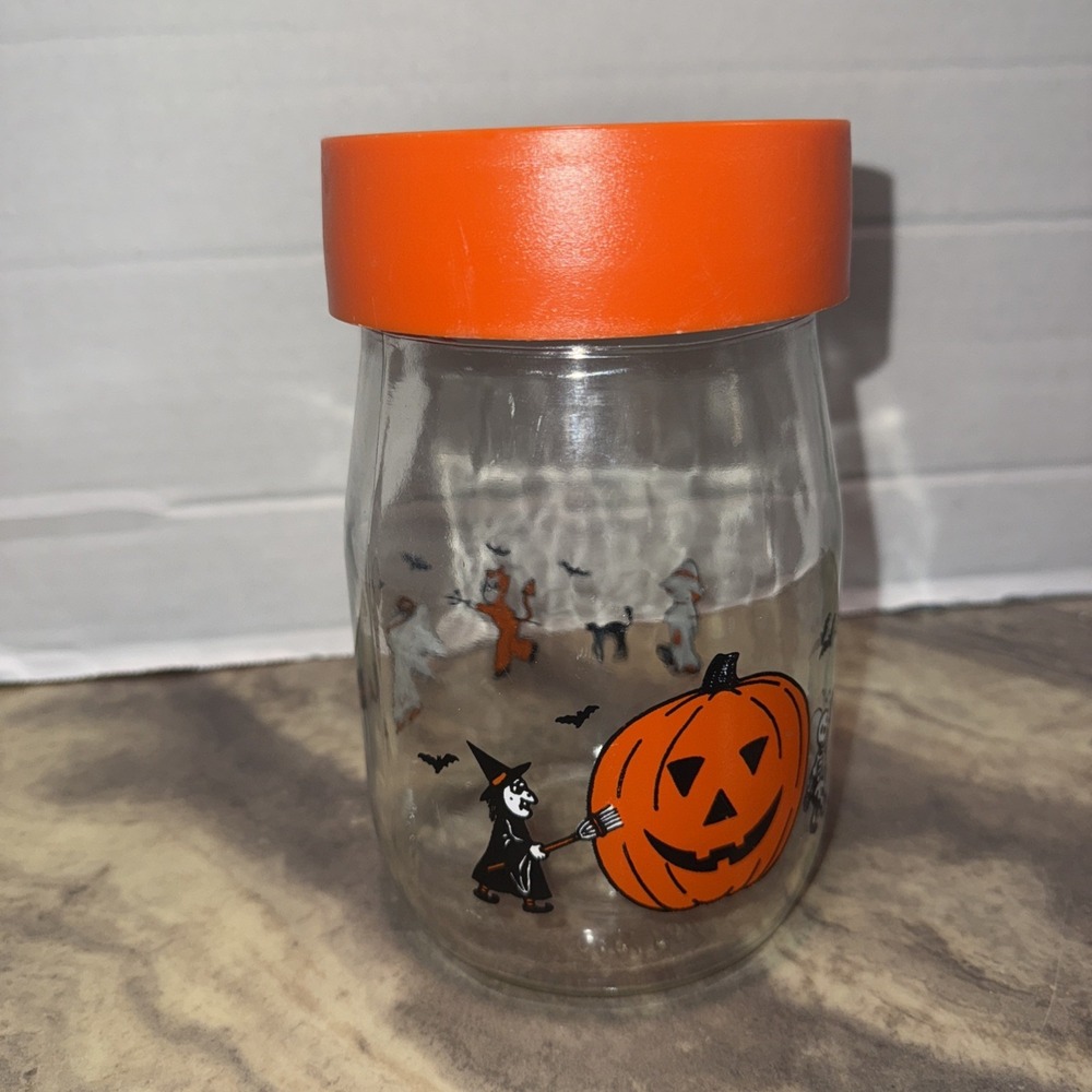 Vintage Carlton glass jar with orange lid Trick-or-treaters pumpkin witch